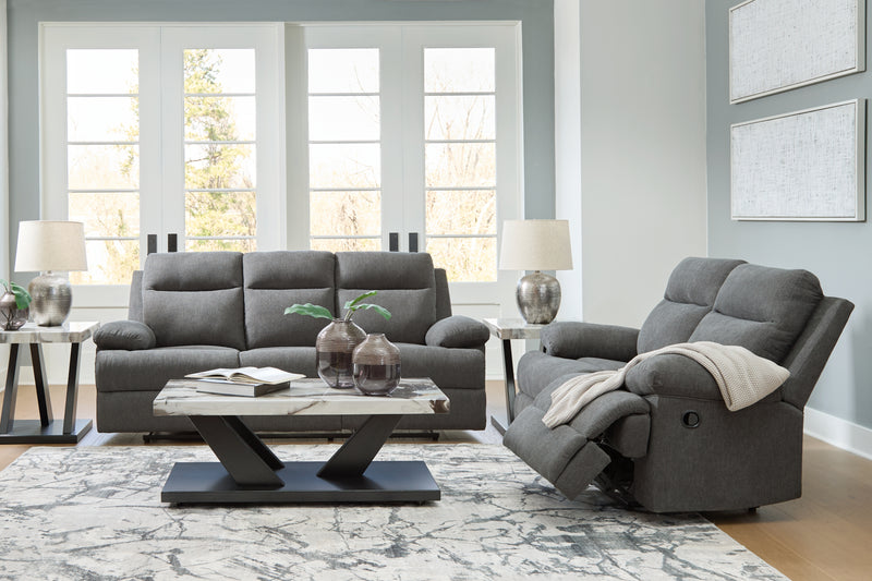 Side-Swipe Reclining Sofa and Loveseat