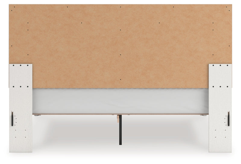 Zuraleus King Upholstered Panel Platform Bed