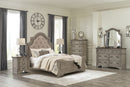 Lodenbay Queen Upholstered Panel Bed, Dresser, Mirror, Chest and Nightstand