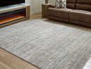 Fuadwick 7'10" x 10' Area Rug