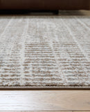 Fuadwick 7'10" x 10' Area Rug